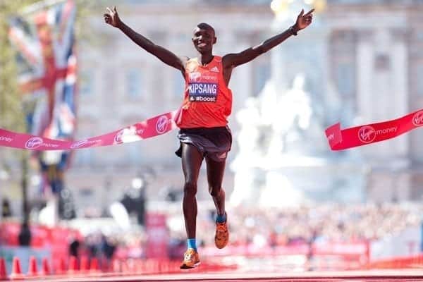 Wilson Kipsang of Kenya crosses the line to win the men's race in the 2014 London Marathon on The Mall in central London on April 13, 2014. PHOTO | LEON NEAL