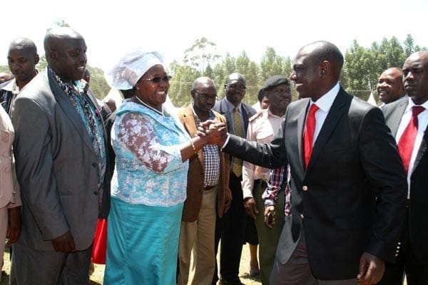 PHOTO | JACOB OWITI Deputy President William Ruto is welcomed by  Kericho Woman Representative Ms Hellen Chepkwony during her homecoming party at Ng’oina Primary School on May 24, 2014.
