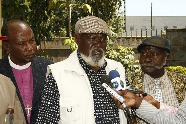 Luo Council of Elders Chairman Mr Meshack Riaga Ogallo (centre) address the press in Kisumu. The elders warned election losers to stop interfering with county governments. PHOTO/JACOB OWITI