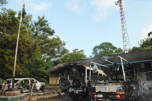 Charred vehicles at Mpeketoni Police Station on June 16, 2014. The town in Lamu County was attacked on the night of June 15, 2014. PHOTO | AFP