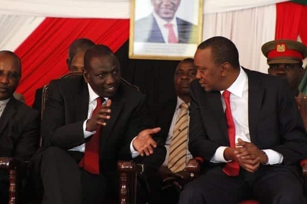 President Uhuru Kenyatta (R) with his deputy William Ruto. The two leaders are expected to attend a national day of prayer Saturday at Uhuru Park. PHOTO | DIANA NGILA | FILE