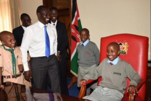 Ruto with students