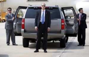 Secret Service agents await the arrival of U.S. Presidential candidate Obama in Durham
