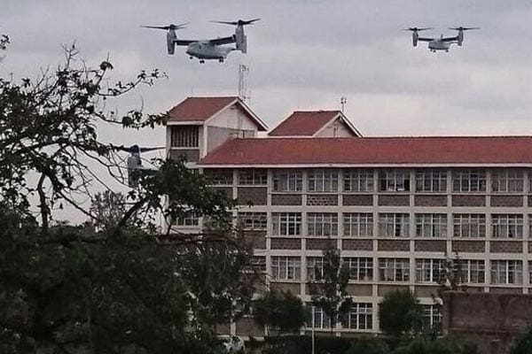 Two V-22 Ospreys fly over Kenyatta University