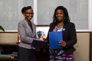 KU Vice Chancellor Prof Olive Mugenda (right) and BRCK's board member Juliana Rotich exchange MoU documents on promotion of digital literacy on August 7, 2015.  NATION