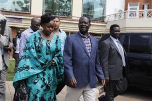 Brewing storm: Mbita MP Millie Odhiambo with Cord leader Raila Odinga and Minority Leader Francis Nyenze after a Sunday service at the Lutheran Church, Nairobi, on May 19.