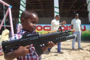 Kid with gun