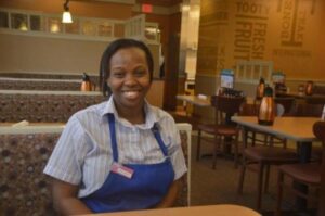 Eileen Lusamukha, a native Kenyan, juggles her pursuit of a bachelor’s degree and soon a master’s degree with her job at Belton’s IHOP.