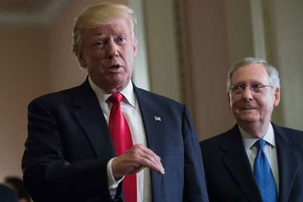 US President-elect Donald Trump speaks to the press with Senate Majority Leader Mitch McConnell (right) following a meeting at the Capitol in Washington, DC, on November 10, 2016. PHOTO | NICHOLAS KAMM | AFP