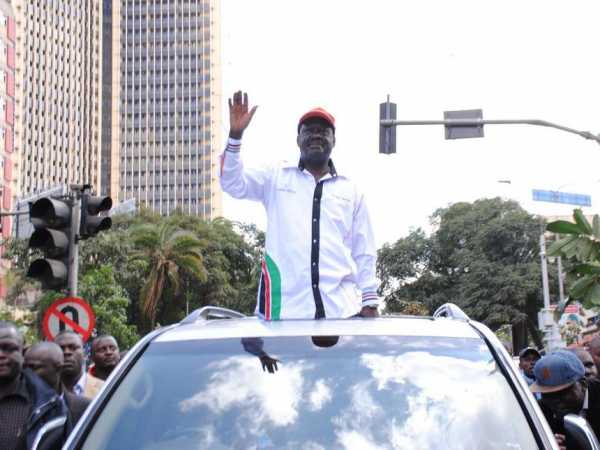 Cord leader Raila Odinga waves to supporters during anti-IEBC demonstrations, June 6, 2016. /PATRICK VIDIJA