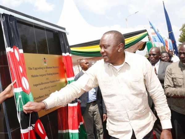 President Uhuru Kenyatta when he launched upgrade works of the Malaba-Angurai-Moding-Kakamer and the Angurai-Rwatama-Malakisi roads during his final lap of Western tour. /PSCU
