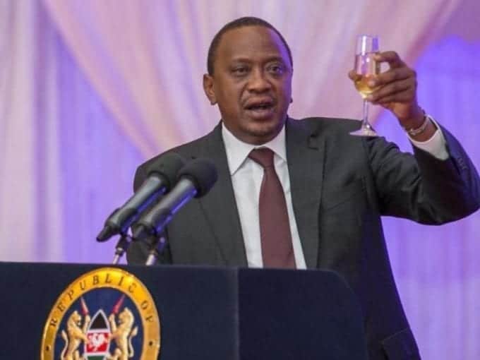 President Uhuru Kenyatta toasting./PSCU