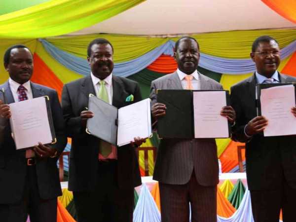 Opposition leaders Kalonzo Musyoka (Wiper), Musalia Mudavadi (Amani), Raila Odinga (Cord/ODM) and Moses Wetang'ula (Ford Kenya) after the signing of Nasa's agreement at Okoa Kenya offices in Nairobi, February 22, 2017. /COURTESY