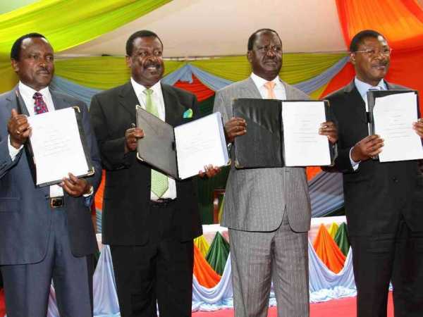 National Super Alliance principals (from L) Kalonzo Musyoka, Musalia Mudavadi, Raila Odinga and Moses Wetangula display the signed copy of coalition agreement that they will use to face the Jubilee Party in the August 8 elections on February 22, 2017. Photo/Jack Owuor