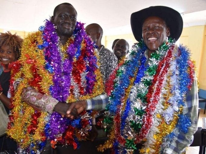 Turkana Governor elect Josphat Nanok (Left, decorated) and Senator elect Malachy Ekal in Turkana on Saturday August 12, 2017. /STEPHEN RUTTO