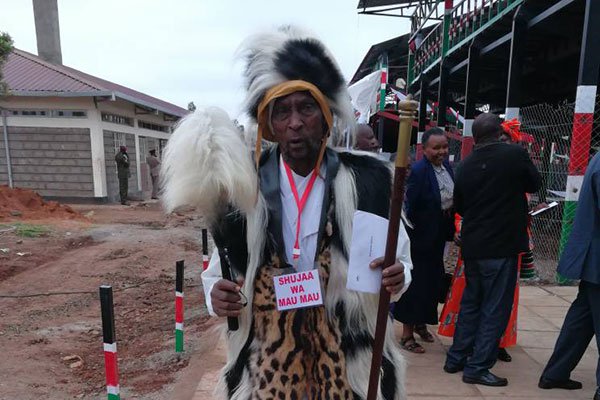 Mau Mau fighter arrives for the celebrations at
