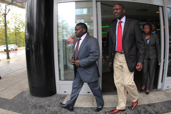 Deputy President William Ruto leaving Movenpick hotel with Journalist Joshua Sang after Ruto addressed a press conference on October 15, 2013.  Photo/FILE