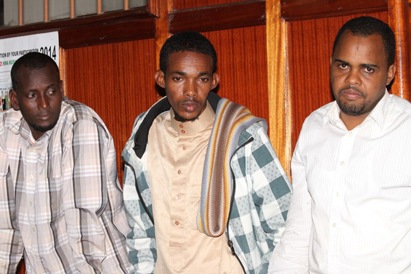 PHOTO | PAUL WAWERU Mr Ahmed Dugal Ali (right), the owner of the vehicle which exploded at the Pangani police station killing four occupants in a Nairobi court on April 25, 2014. He is with Mr Abdiaziz Bulle Ali (centre) and Mr Mohammed Abdullahi Falir.