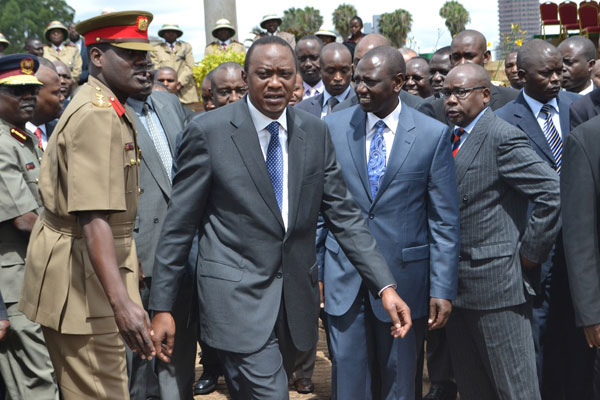 President Uhuru Kenyatta (second left) Deputy William Ruto (third left) and Attorney general Githu Muigai (second right). Kenya’s Attorney General Githu Muigai has urged the International Criminal Court (ICC) to stop showing contempt for Kenya’s judicial order even as it sets up local tribunal. Photo/ JEFF ANGOTE
