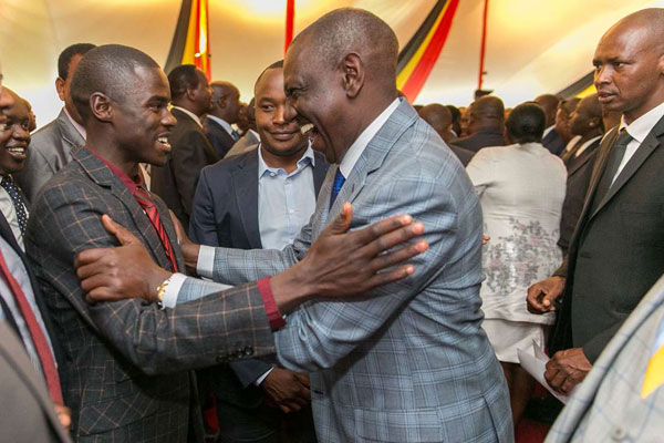 Deputy President William Ruto with Igembe South MP John Paul Mwirigi during the Jubilee parliamentary group meeting at State House, on August 30, 2017. PHOTO | PSCU