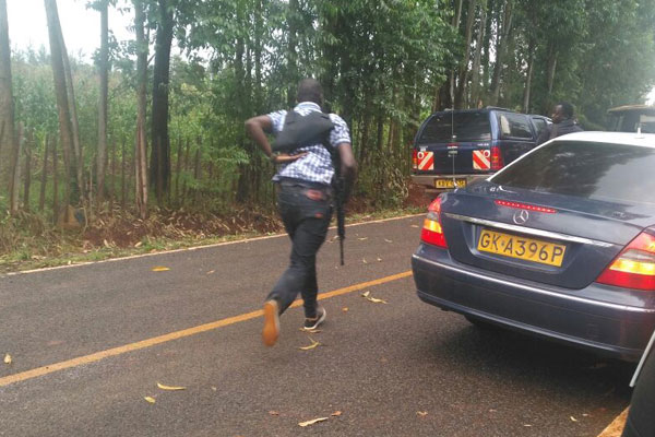 A police officer arrives at Sugoi, the home of DP Ruto that is under attack.