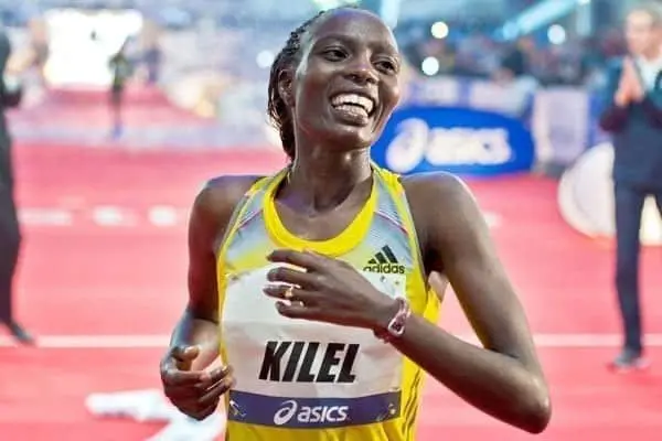 Kenyans Dominate Frankfurt Marathon 2 PHOTO | BORRIS ROESSLER Caroline Kilel crosses the finish line to win the Frankfurt Marathon on October 27, 2013.