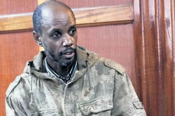 Brian Musomba Maweu, also known as Catfish, in a Nairobi court on June 30, 2014, when the Director of Public Prosecutions began extradition proceedings against him. PHOTO | PAUL WAWERU | NATION MEDIA GROUP