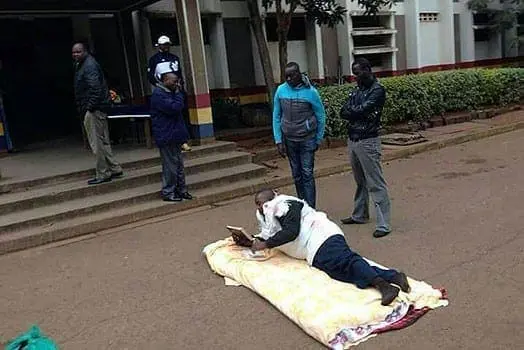 Charles Kamau, 33, at the entrance of the Langata police station. PHOTO | COURTESY