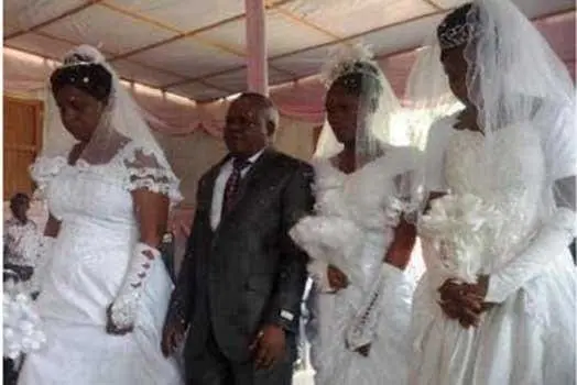 man weds three women in church Pomp and colour as man weds three women in church on the same day