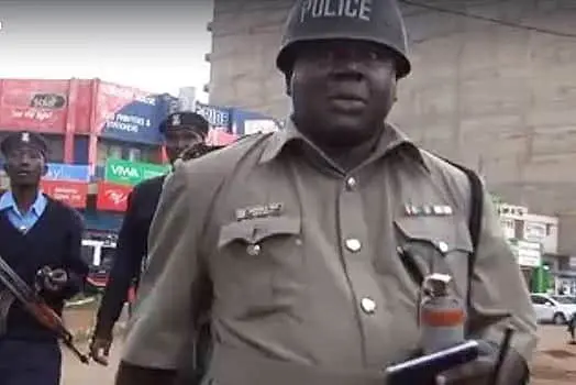 Deputy OCS Pius Misikhu moments before smashing the camera of journalist Duncan Wanga. PHOTO | COURTESY