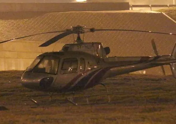 Kenyan pilot lands chopper on busy highway to hug his mother