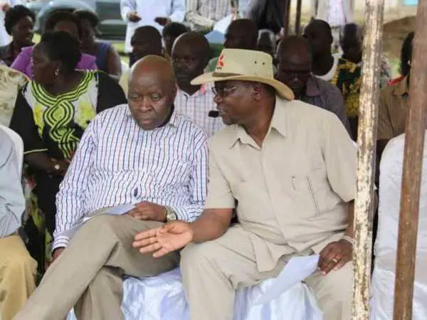 John Marirmoi, former Marakwet East MP and assistant minister in the Moi government, chats with former IG David Kimaiyo at a rally in Tot, September 30, 2016. /STEPHEN RUTTO John Marirmoi, former Marakwet East MP and assistant minister in the Moi government, chats with former IG David Kimaiyo at a rally in Tot, September 30, 2016. /STEPHEN RUTTO