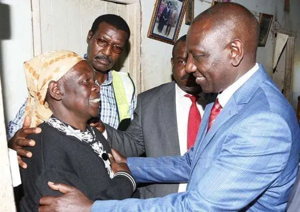 DP Ruto threatens to sue activist for defamation 1 Deputy President William Ruto speaks to Anne Walelal after he launched the Last Mile Connectivity Project at Mois Bridge Likuyan in Kakamega on October 1, 2016. He has threatened to sue Boniface Mwangi for defamation. PHOTO | DPPS