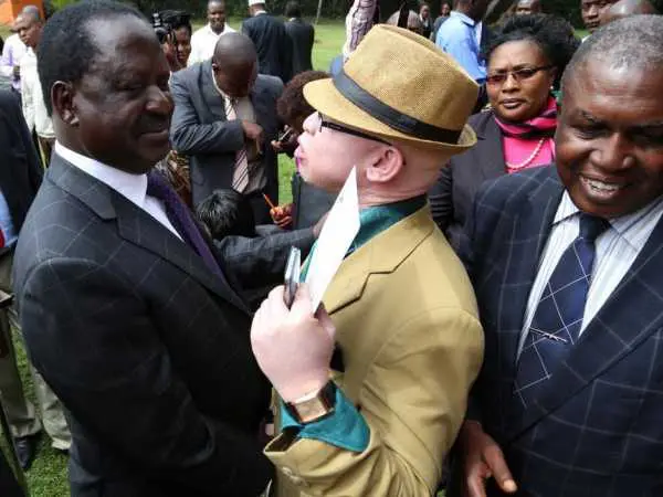 Raila and Isaac Mwaura Raila hits back at Mwaura over deregistration, calls ODM rebels prostitutes