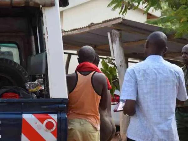 Car theft suspects Fredrick Omondi and Harman Mkalla (naked) outside Kwale law courts, March 6, 2017. /ALLOYS MUSYOKA