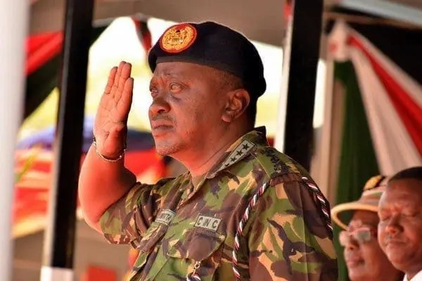 President Uhuru Kenyatta salutes the General Service Unit (GSU) officers