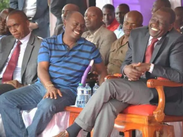 Deputy President William Ruto and Kiambu Governor William Kabogo during a fundraising for SDA Church in Kimbo, Githurai in Kiambu County on September 22, 2014. Photo/FILE