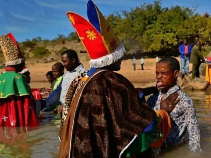 "Many charismatic churches in Africa perform baptisms in rivers." /BBC