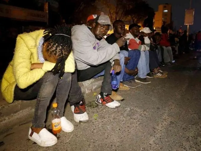 People queue to vote outside a polling station in Nairobi ahead of the opening of the presidential election, August 8, 2017. /REUTERS