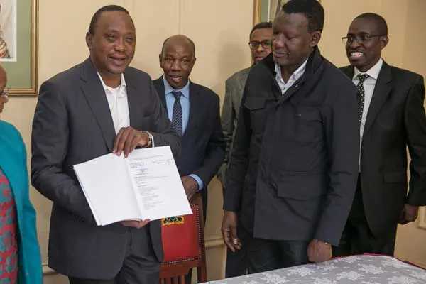 President Uhuru Kenyatta Files Response to Nasa Election Petition 1 President Uhuru Kenyatta (left )after signing