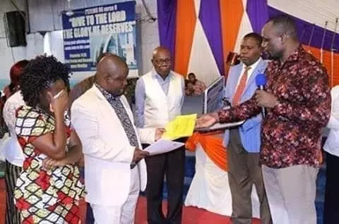 Bishop Robert Wafula handing over his resignation