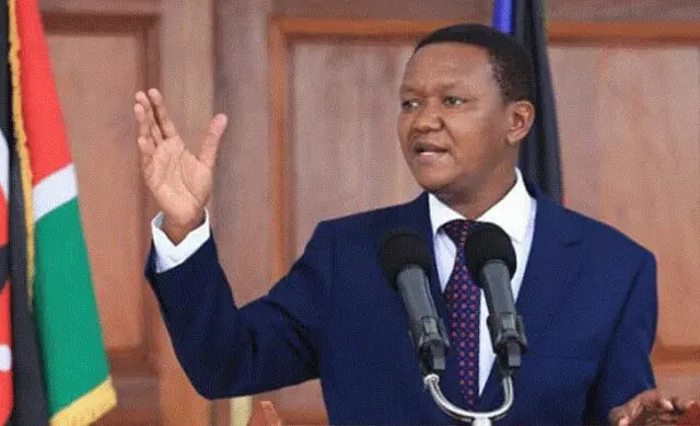 Alfred Mutua visits with professor of politics