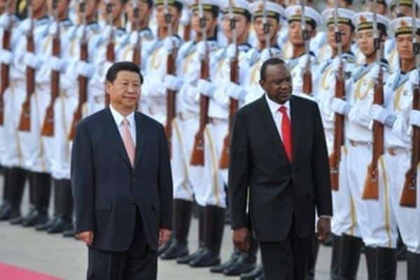 UHURU TAKES HIS COOKS, LAMB CHOPS ON CHINA TRIP