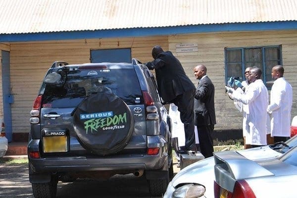 Experts examine a car belonging to Bungoma senator-elect Moses Wetangula at Kilimani police station on December 10, 2013. PHOTO | ANTHONY OMUYA