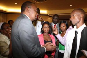 President Uhuru Kenyatta meets with some of the Kenyans living in Uganda.