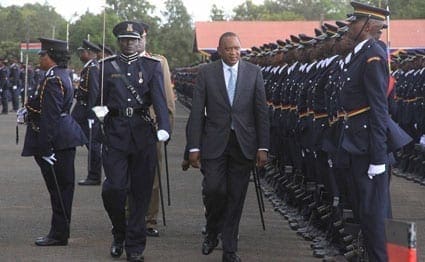 President Uhuru Kenyatta inspects a guard of honour parade during a pass out ceremony of 2209 police recruits at Kiganjo police college in Nyeri county on April 4, 2014. Photo/ JOSEPH KANYI