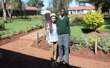 Laviniah Karanja at Ruthagati Secondary School in Karatina, Nyeri County together with Charles Mwangi, a beneficiary of Project1917. PHOTO/STELLAR MURUMBA