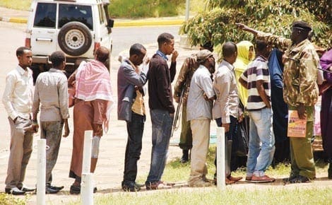 A group of illegal Eastleigh residents found without proper documents are booked at the Safaricom Stadium Karasani on Monday.  [PHOTOS: GEORGE NJUNGE AND JEFF OCHIENG/STANDARD]