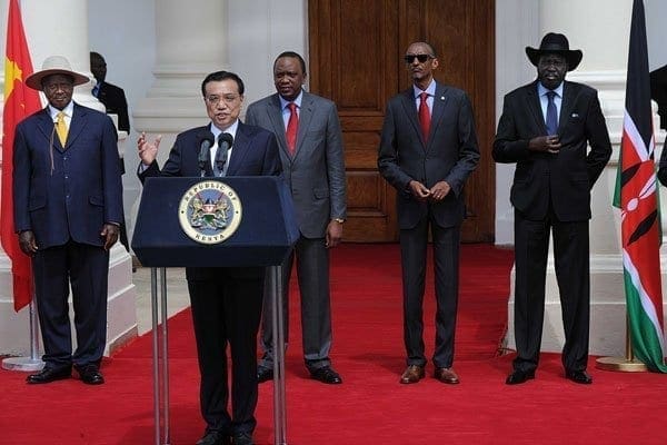 Chinese Premier Li Keqiang (L) gives a speech next to (L-R) Uganda's President Yoweri Museveni, Kenya's President Uhuru Kenyatta, Rwanda's President Paul Kagame, and South Sudan's President Salva Kiir on May 11, 2014 after the signing of the Standard Gauge Railway agreement at the State House in Nairobi. Hopes of building a modern railway line in East Africa rose yesterday after Kenya and China signed a financial agreement committing the two countries to the Sh327 billion mega project. AFP/PHOTO