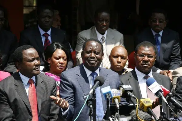 Cord Leaders Kalonzo Musyoka (left),Raila Odinga (centre) and Moses Wetangula address journalists at Orange House in Nairobi on the June 3, 2014. Cord leaders on Tuesday asked Jubilee to name its team to prepare the terms of engagement for the conference being proposed by the Opposition on the challenges facing the country. PHOTO/EVANS HABIL